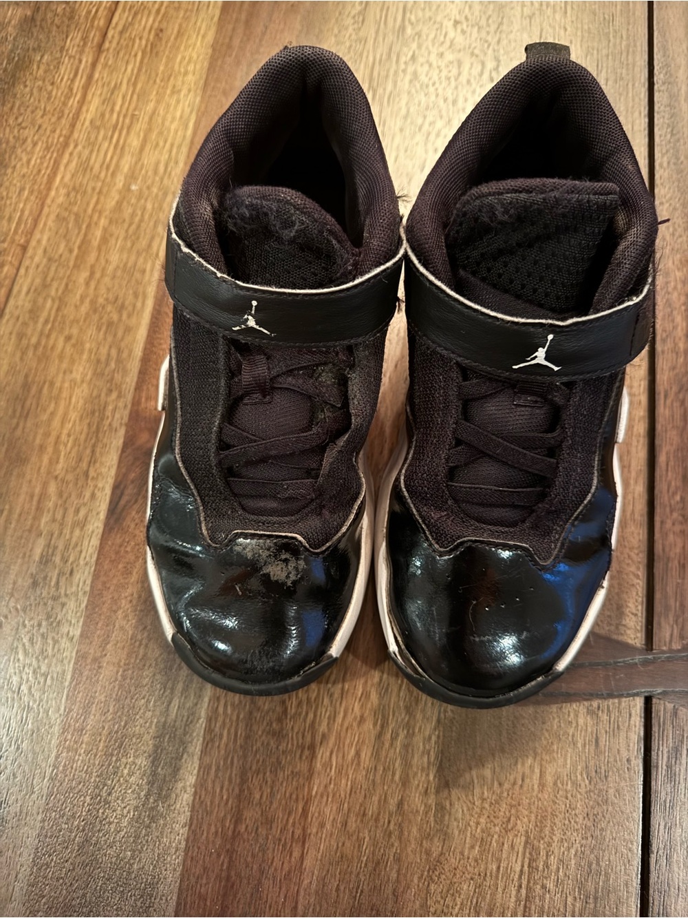 Jordan Kids Black and White High-Top Sneakers